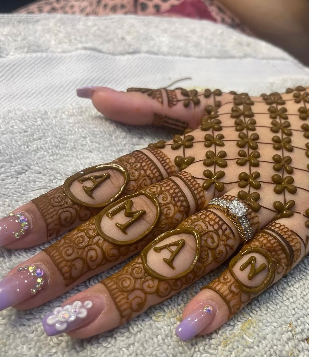 Aman name mehndi design with bold letters