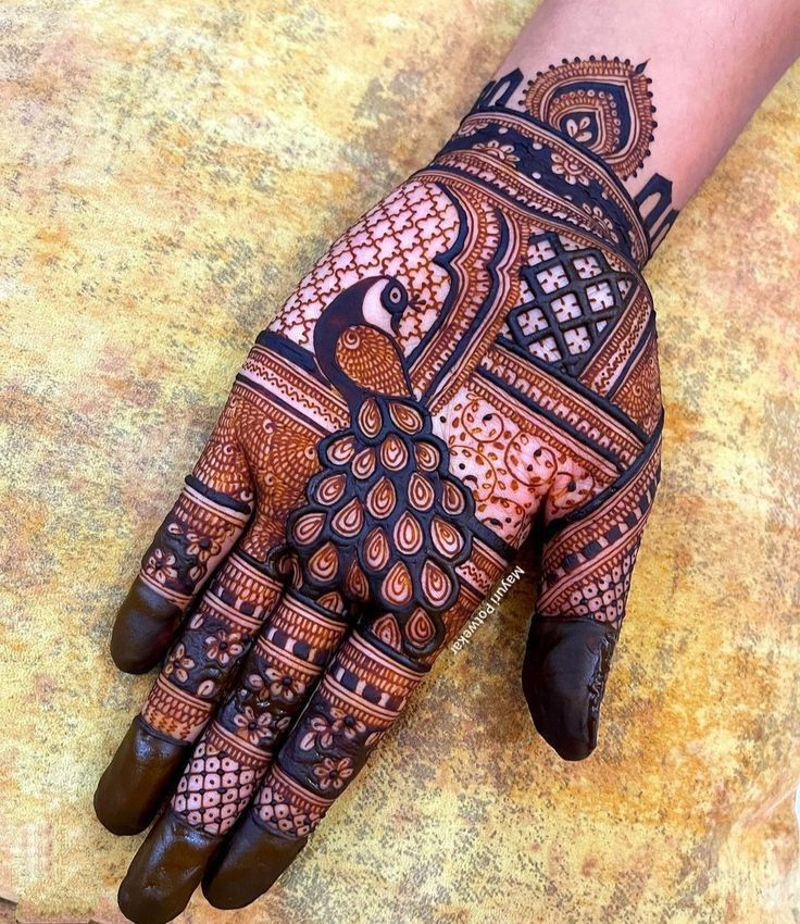 Peacock mehndi design with checks pattern