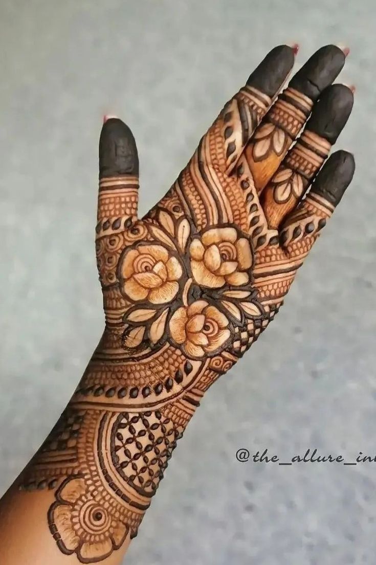 rose mehndi on hand till mid length